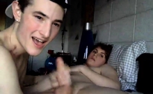 Two gay hot twinks jerking off together