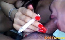 indonesian babe giving bj while smoking