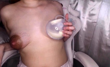 Redhead Mommy Extracts Milk From Her Hard Nipples