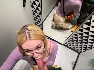 Gf gives a blowjob in the changing booth