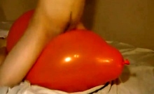 Twink Humping and Cumming on an Inflatable Orange Balloon